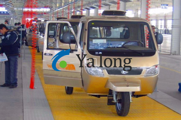 Smart tricycle assembly line: a large-scale production solution compatible with multiple models